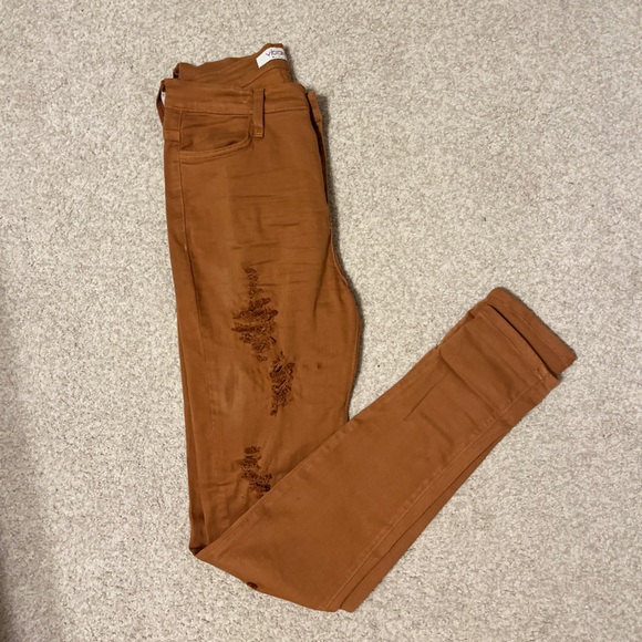Like new Vibrant size 11 stretchy jeans, factory distressed camel colored - Picture 4 of 5